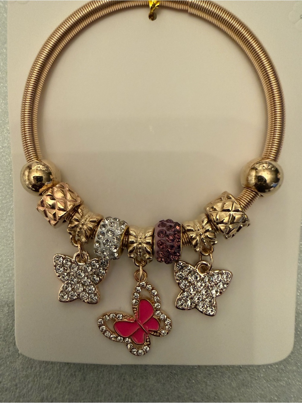 Gold-Tone Butterfly Charm Bracelet with Pink and Purple Accents
